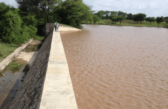 A check dam – weir structure in the riverbed, facilitating groundwater recharge during monsoon season
